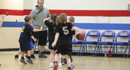 Thomas H. Ewing coaching youth basketball